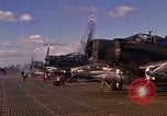 Image of A-1E Skyraider aircraft operating on ground Southeast Asia, 1966, second 17 stock footage video 65675042967