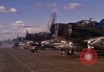 Image of A-1E Skyraider aircraft operating on ground Southeast Asia, 1966, second 20 stock footage video 65675042967