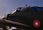 Image of A-1E Skyraider aircraft operating on ground Southeast Asia, 1966, second 36 stock footage video 65675042967