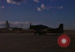 Image of A-1E Skyraider aircraft operating on ground Southeast Asia, 1966, second 44 stock footage video 65675042967