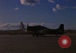 Image of A-1E Skyraider aircraft operating on ground Southeast Asia, 1966, second 46 stock footage video 65675042967