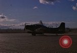 Image of A-1E Skyraider aircraft operating on ground Southeast Asia, 1966, second 48 stock footage video 65675042967
