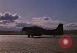 Image of A-1E Skyraider aircraft operating on ground Southeast Asia, 1966, second 52 stock footage video 65675042967