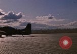 Image of A-1E Skyraider aircraft operating on ground Southeast Asia, 1966, second 55 stock footage video 65675042967
