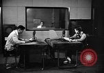 Image of Japanese Station announcer Tokyo Japan, 1945, second 12 stock footage video 65675043006