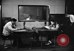 Image of Japanese Station announcer Tokyo Japan, 1945, second 55 stock footage video 65675043006