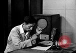 Image of Japanese Station announcer Tokyo Japan, 1945, second 3 stock footage video 65675043008