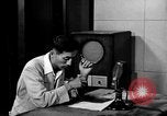 Image of Japanese Station announcer Tokyo Japan, 1945, second 4 stock footage video 65675043008