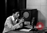 Image of Japanese Station announcer Tokyo Japan, 1945, second 6 stock footage video 65675043008