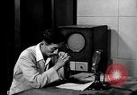 Image of Japanese Station announcer Tokyo Japan, 1945, second 7 stock footage video 65675043008