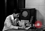 Image of Japanese Station announcer Tokyo Japan, 1945, second 9 stock footage video 65675043008