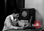 Image of Japanese Station announcer Tokyo Japan, 1945, second 12 stock footage video 65675043008