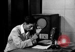 Image of Japanese Station announcer Tokyo Japan, 1945, second 17 stock footage video 65675043008