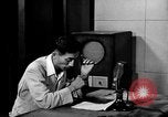 Image of Japanese Station announcer Tokyo Japan, 1945, second 18 stock footage video 65675043008