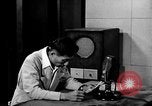 Image of Japanese Station announcer Tokyo Japan, 1945, second 23 stock footage video 65675043008