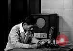 Image of Japanese Station announcer Tokyo Japan, 1945, second 24 stock footage video 65675043008