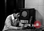 Image of Japanese Station announcer Tokyo Japan, 1945, second 25 stock footage video 65675043008