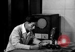 Image of Japanese Station announcer Tokyo Japan, 1945, second 32 stock footage video 65675043008
