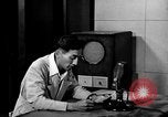 Image of Japanese Station announcer Tokyo Japan, 1945, second 33 stock footage video 65675043008
