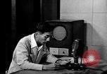 Image of Japanese Station announcer Tokyo Japan, 1945, second 37 stock footage video 65675043008