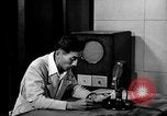 Image of Japanese Station announcer Tokyo Japan, 1945, second 38 stock footage video 65675043008