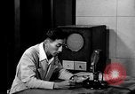 Image of Japanese Station announcer Tokyo Japan, 1945, second 39 stock footage video 65675043008