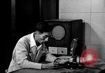Image of Japanese Station announcer Tokyo Japan, 1945, second 48 stock footage video 65675043008