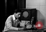 Image of Japanese Station announcer Tokyo Japan, 1945, second 50 stock footage video 65675043008