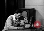 Image of Japanese Station announcer Tokyo Japan, 1945, second 59 stock footage video 65675043008