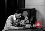 Image of Japanese Station announcer Tokyo Japan, 1945, second 61 stock footage video 65675043008