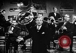Image of Singer Al Trace in war bond drive United States USA, 1943, second 14 stock footage video 65675043013