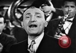 Image of Singer Al Trace in war bond drive United States USA, 1943, second 23 stock footage video 65675043013