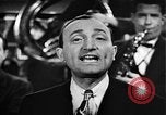 Image of Singer Al Trace in war bond drive United States USA, 1943, second 32 stock footage video 65675043013