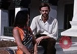 Standbild Frau spricht über Mikrofon Kathmandu Nepal, 1969, aus Sekunde 45 historischem Filmmaterial Videoclip 65675043064