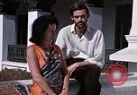 Standbild Frau spricht über Mikrofon Kathmandu Nepal, 1969, aus Sekunde 56 historischem Filmmaterial Videoclip 65675043064