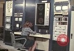 Image of Woman operates computer controls New Mexico United States USA, 1975, second 1 stock footage video 65675043084