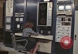 Image of Woman operates computer controls New Mexico United States USA, 1975, second 5 stock footage video 65675043084