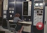 Image of Woman operates computer controls New Mexico United States USA, 1975, second 9 stock footage video 65675043084