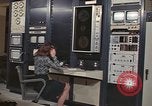 Image of Woman operates computer controls New Mexico United States USA, 1975, second 12 stock footage video 65675043084
