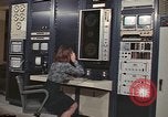 Image of Woman operates computer controls New Mexico United States USA, 1975, second 13 stock footage video 65675043084