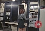 Image of Woman operates computer controls New Mexico United States USA, 1975, second 15 stock footage video 65675043084