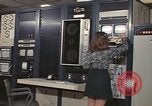 Image of Woman operates computer controls New Mexico United States USA, 1975, second 17 stock footage video 65675043084