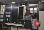 Image of Woman operates computer controls New Mexico United States USA, 1975, second 20 stock footage video 65675043084