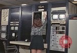 Image of Woman operates computer controls New Mexico United States USA, 1975, second 23 stock footage video 65675043084