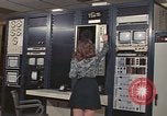 Image of Woman operates computer controls New Mexico United States USA, 1975, second 25 stock footage video 65675043084