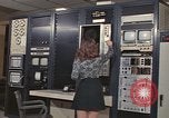Image of Woman operates computer controls New Mexico United States USA, 1975, second 26 stock footage video 65675043084