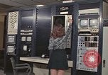 Image of Woman operates computer controls New Mexico United States USA, 1975, second 27 stock footage video 65675043084