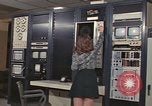 Image of Woman operates computer controls New Mexico United States USA, 1975, second 28 stock footage video 65675043084