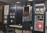 Image of Woman operates computer controls New Mexico United States USA, 1975, second 29 stock footage video 65675043084