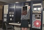Image of Woman operates computer controls New Mexico United States USA, 1975, second 30 stock footage video 65675043084